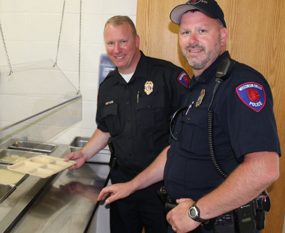 Officers serve food (copy)